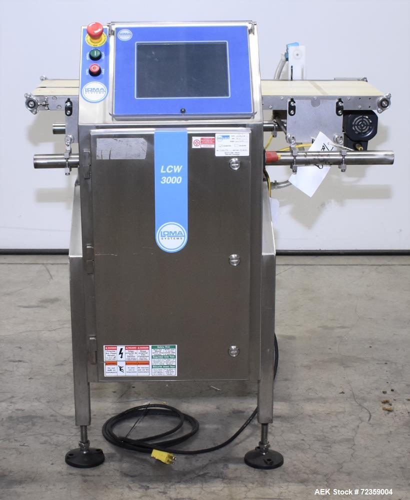 Used Loma LCW-3000 Belt Checkweigher with Reject. Up to 6.6 lbs capacity.